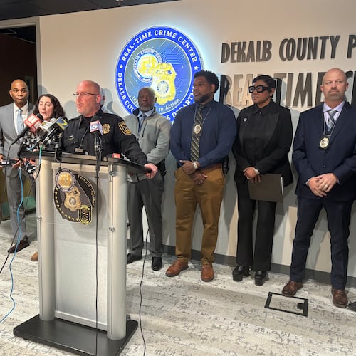 DeKalb County police Chief Greg Padrick (at lectern) spoke during a news conference Monday about the shooting of a 3-year-old boy over the weekend. (David Aaro/AJC)