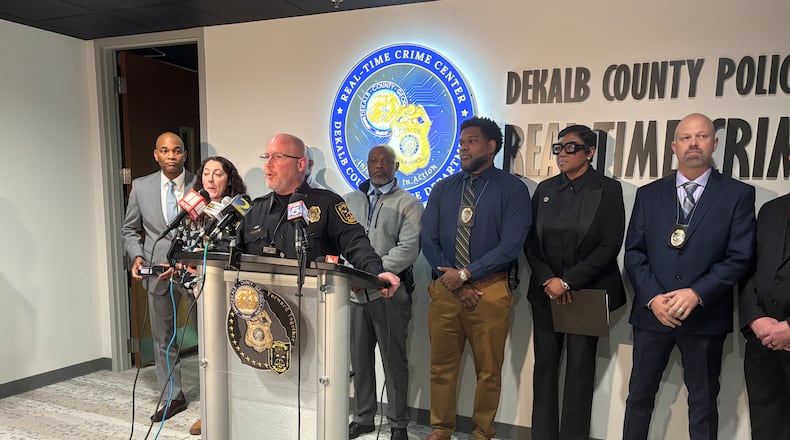 DeKalb County police Chief Greg Padrick (at lectern) spoke during a news conference Monday about the shooting of a 3-year-old boy over the weekend. (David Aaro/AJC)