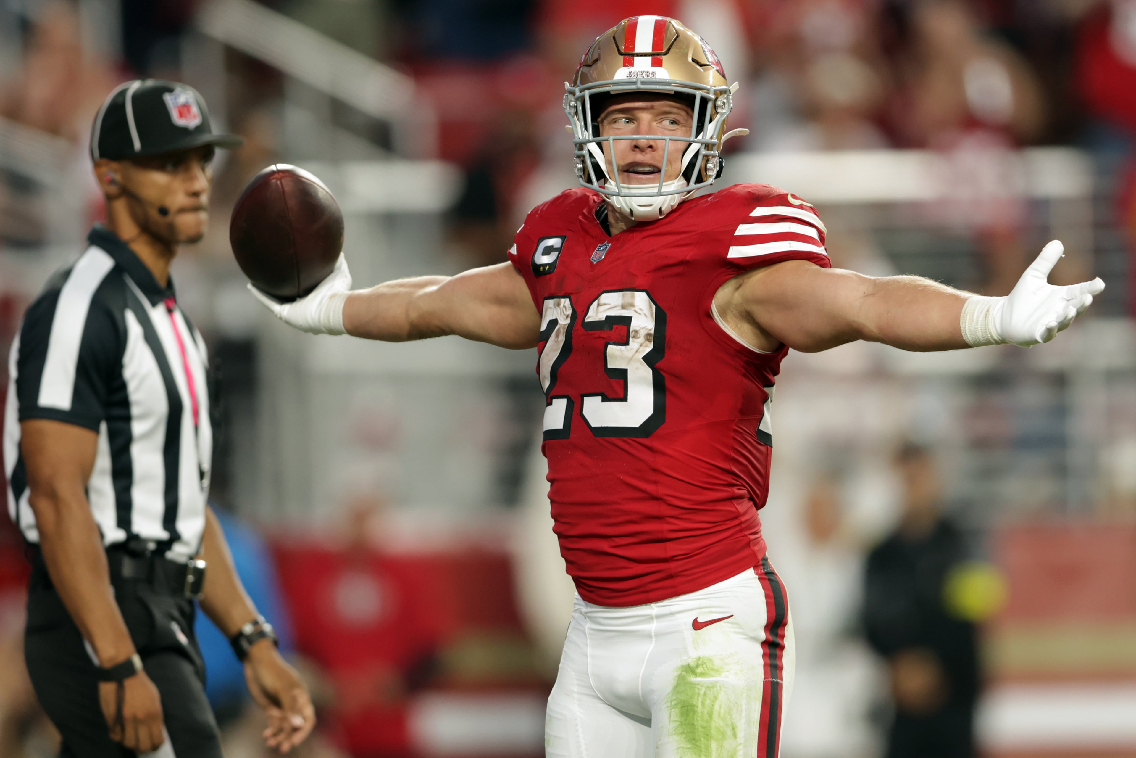 The 49ers' Christian McCaffrey celebrates a second-quarter touchdown run against the Falcons on Sunday, Oct. 19, 2025, in Santa Clara, Calif. (Scott Strazzantez/San Francisco Chronicle via AP)