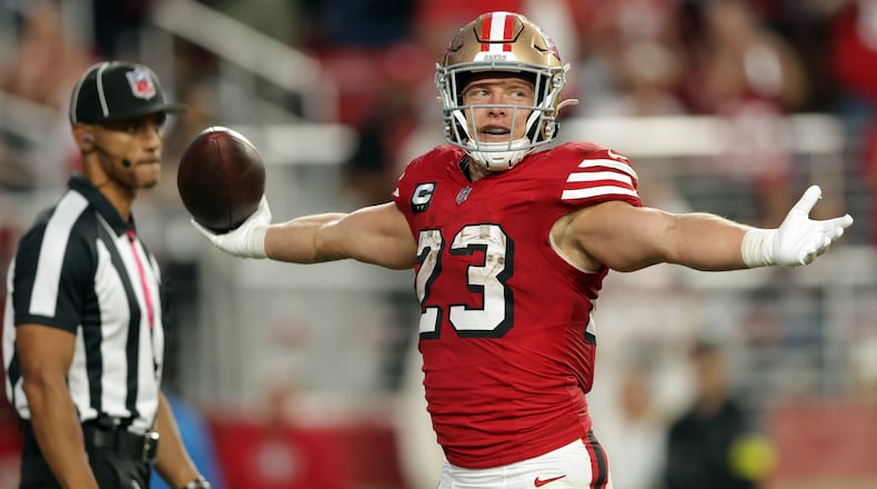 San Francisco 49ers' Christian McCaffrey celebrates a second-quarter touchdown run  against the Atlanta Falcons during an NFL football game in Santa Clara, Calif., on Sunday, Oct. 19, 2025. (Scott Strazzantez/San Francisco Chronicle via AP)