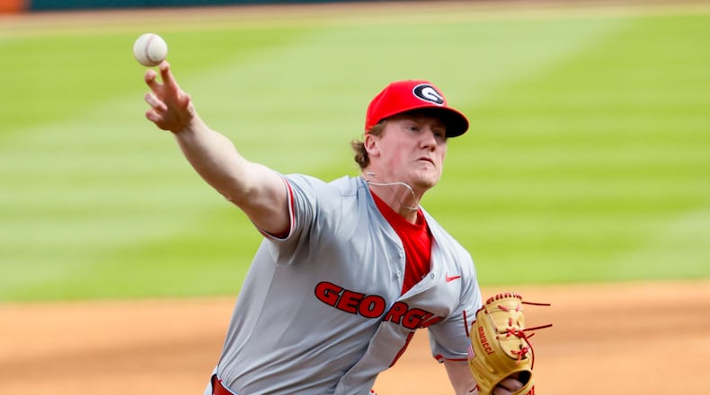 UGA bulldogs starting pitcher Leighton Finley (12) delivers a pitch during the first inning against Georgia Tech batter on Sunday, March 3, 2024, at Coolray Field in Lawrenceville.
Miguel Martinez /miguel.martinezjimenez@ajc.com
