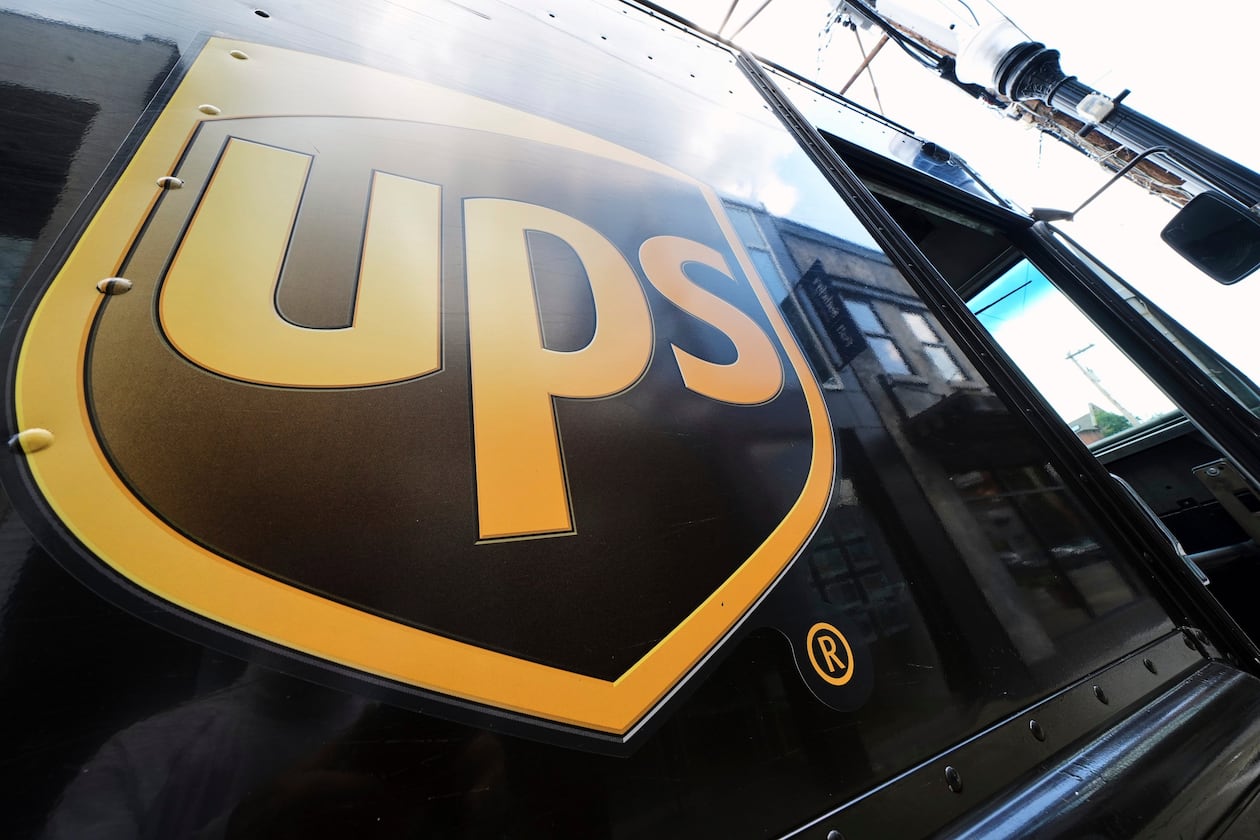 UPS announced Tuesday it closed 93 buildings this year and cut 34,000 operational jobs. (Gene J. Puskar/AP file)