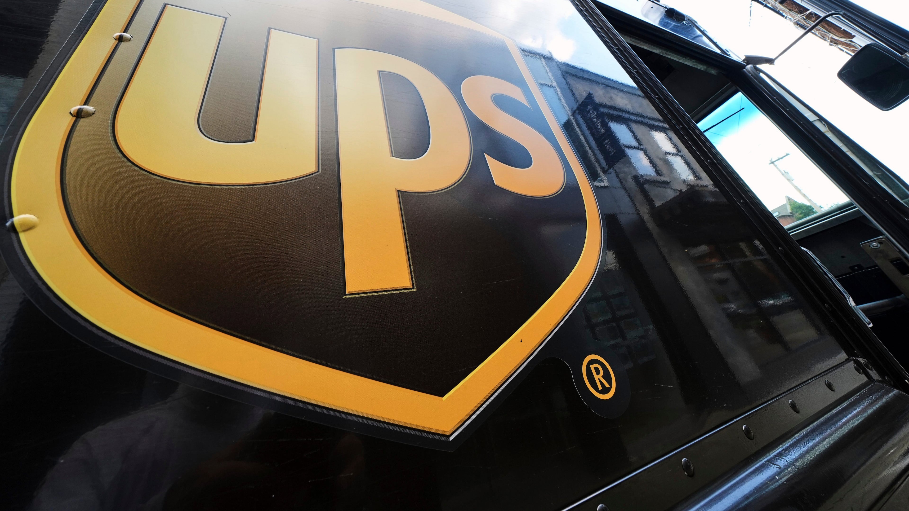 UPS announced Tuesday it closed 93 buildings this year and cut 34,000 operational jobs. (Gene J. Puskar/AP file)
