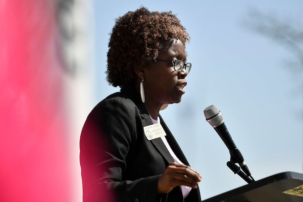 State Rep. Jasmine Clark speaks during the "Stand Up for Science" rally last year at the Georgia State Capitol. (Daniel Varnado for the Atlanta Journal-Constitution)