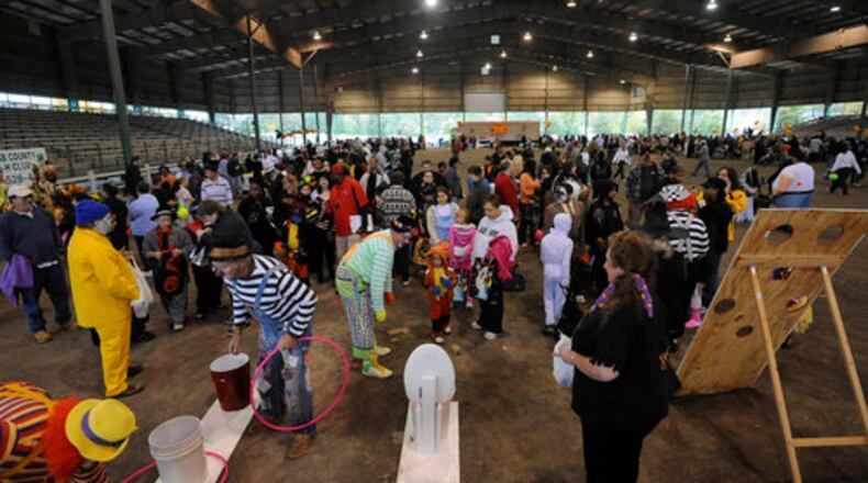 Volunteers from Shrine Circus entertain during the Fall Festival of Fun event Saturday.