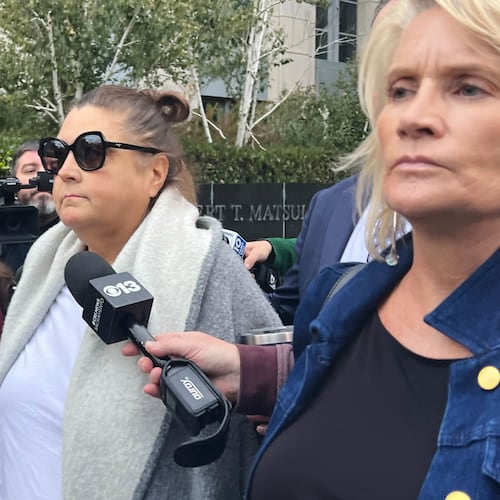Dana Williamson, a former top aide to Gov. Gavin Newsom, center, leaves the courthouse Wednesday, Nov. 12, 2025, in Sacramento, Calif., after being indicted on federal charges alleging her involvement in a scheme to steal campaign money from former federal Health Secretary Xavier Becerra. (AP Photo/Sophie Austin)