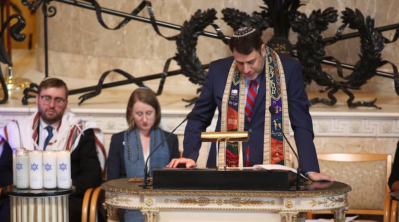 Rabbi Peter Berg speaks during a prayer vigil for the victims of the Pittsburgh synagogue deadly shooting at The Temple on Tuesday, October 30, 2018, in Atlanta. The Temple hosted an interfaith prayer vigil in conjunction with Outcry. (Photo: JASON GETZ/SPECIAL TO THE AJC)
