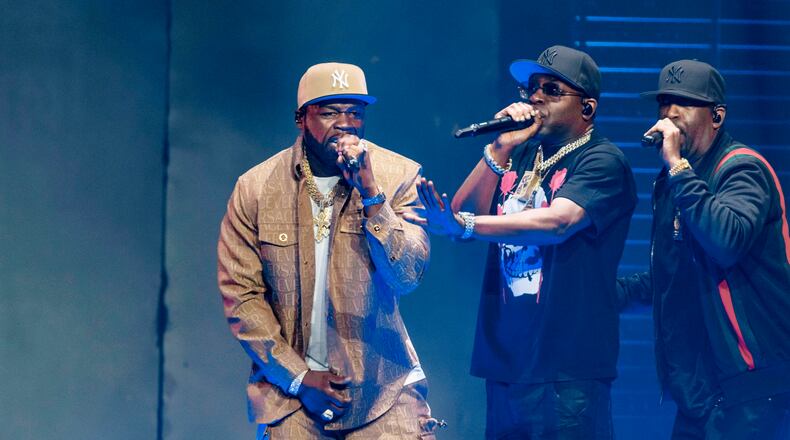 FILE - Rapper Curtis "50 Cent" Jackson, left, performs at the German launch of his "Final Lap Tour" at Hamburg's Barclays Arena in Hamburg, Germany, Friday, Sept. 29, 2023. (Markus Scholz/dpa via AP, File)