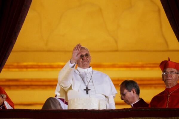 FILE - Pope Francis on the central balcony of St. Peter's Basilica at the Vatican, Wednesday, March 13, 2013. Cardinal Jorge Bergoglio, who chose the name of Francis is the 266th pontiff of the Roman Catholic Church. (AP Photo/Gregorio Borgia, File)