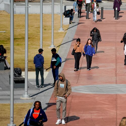 Georgia State University students walk across campus. GSU and Georgia's other public colleges will need to make all of their syllabuses public next fall, raising concerns about academic freedom. (Ben Hendren for the AJC/2023)