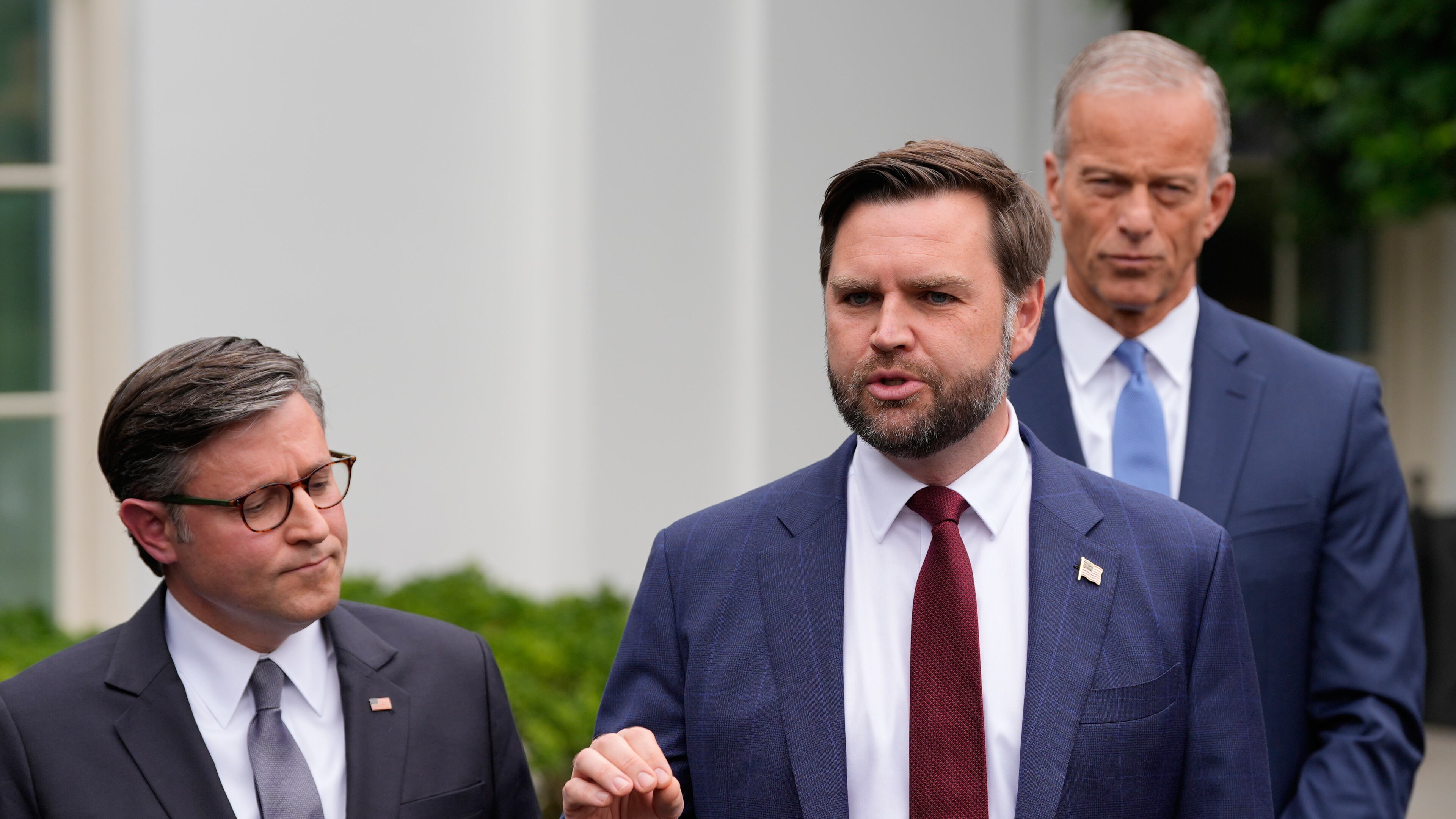 House Speaker Mike Johnson (from left), Vice President JD Vance and Senate Leader John Thune told reporters outside the West Wing of the White House on Monday, Sept. 29, 2025, in Washington, D.C., that Democrats were making unreasonable demands in exchange for avoiding a shutdown. (Alex Brandon/AP)