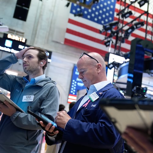 Traders work on the floor at the New York Stock Exchange in New York, Monday, July 6, 2026. (AP Photo/Seth Wenig)