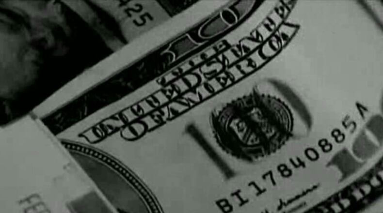 Gwinnett County police are searching for a man they believe scammed two people out of $200,000 in a real estate scheme.