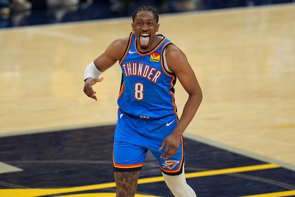 Oklahoma City Thunder forward Jalen Williams (8) motions after making a three pointer against the Indiana Pacers during the second half of Game 3 of the NBA Finals basketball series, Wednesday, June 11, 2025, in Indianapolis. (AP Photo/Abbie Parr)