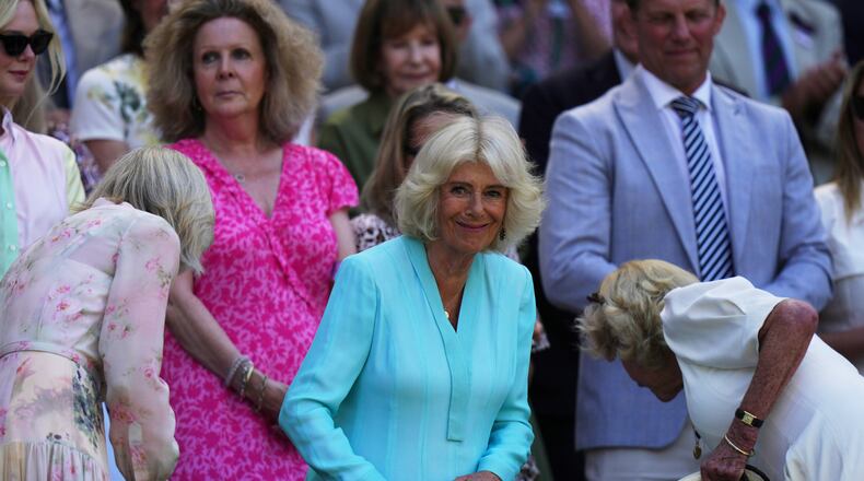 Britain's Queen Camilla arrives to the royal box on day 10 of the Wimbledon Tennis Championships in London, Wednesday, July 8, 2026. (AP Photo/Brian Inganga)