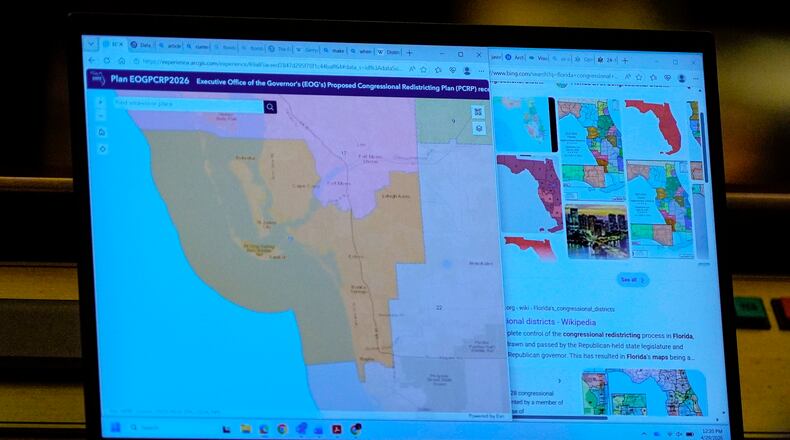 A state Senators laptop displays a proposed Congressional Redistricting Plan during debate on SB 8-D, a redistricting bill, during a special session of the Florida Legislature, Wednesday, April 29, 2026, in Tallahassee, Fla. (AP Photo/Mike Stewart)