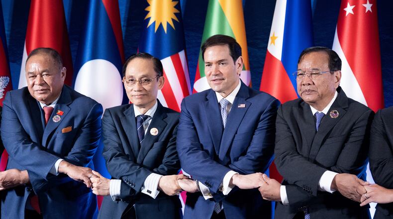 From left, East Timor's Foreign Minister Bendito dos Santos Freitas, Vietnam Foreign Minister Le Hoai Trung, U.S. Secretary of State Marco Rubio and Cambodia's Foreign Minister Prak Sokhonn join hands during the ASEAN Post-Ministerial Conference with the United States on the sidelines of the Association of Southeast Asian Nations (ASEAN) Foreign Ministers' Meeting in Pasay city, Metro Manila, Philippines Wednesday, July 22, 2026. (Brendan Smialowski/Pool Photo via AP)