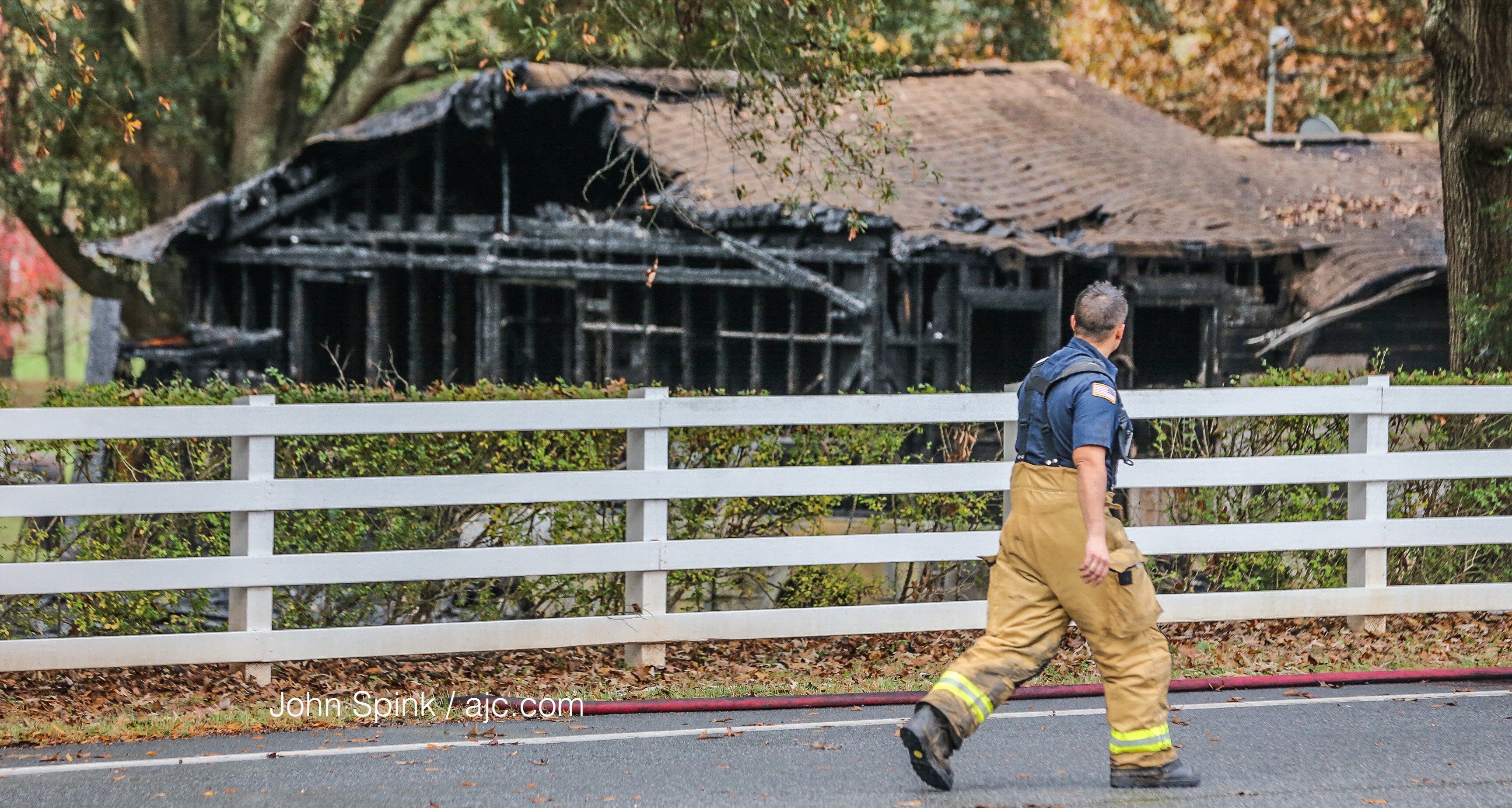 Flames from a tractor-trailer crash spread to a home in Bartow County, authorities said.