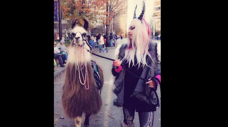 Wamdi Tanka, left, and Jennifer Belgard at a Christmas parade in 2016.