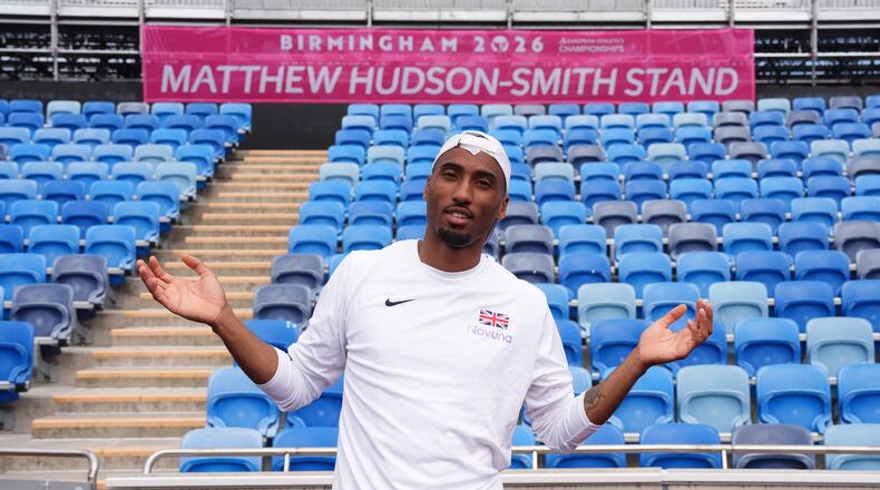 Britain's Matthew Hudson-Smith poses in front of a stand named after him, during a training session ahead of the start of the European Athletics Championships, in Birmingham, England, Sunday, Aug. 9, 2026. (Martin Rickett/PA via AP)