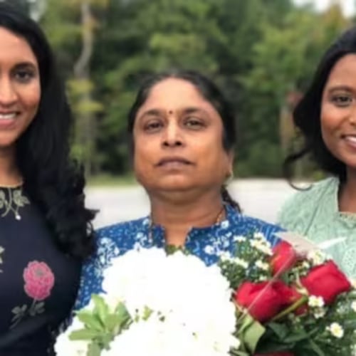 Venkata Vasamsetty, center, with her two daughters. Vasamsetty has lived legally in the country with a green card for 30 years and is a public school special education teacher. She is now in ICE custody. (Courtesy of Helen Parsonage)