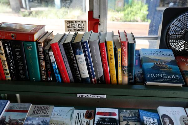 A selection of new books on the shelves of the Book Bus.