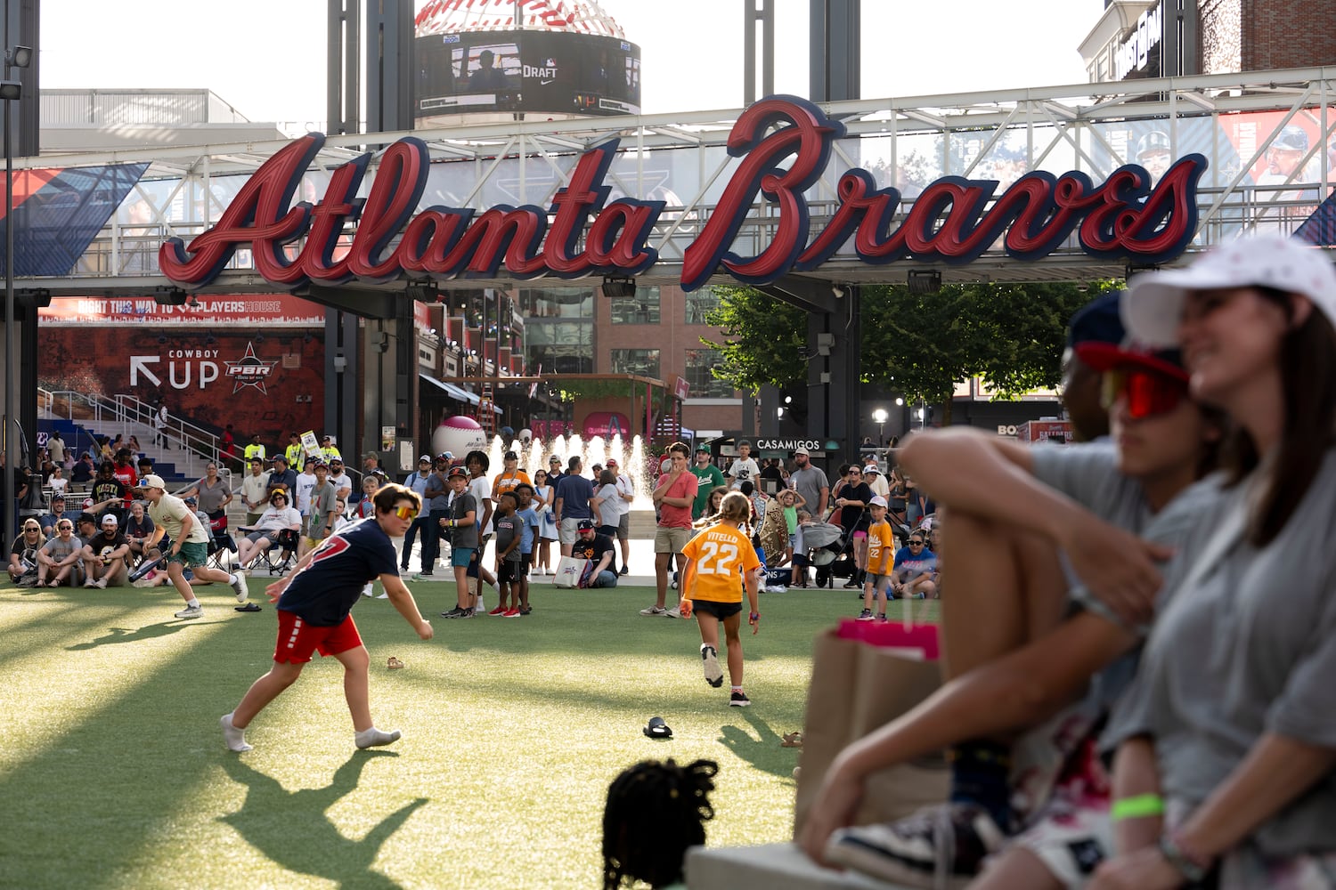 Fans gather at the Battery to watch the 2025 MLB Draft Sunday, July 13, 2025 held at the Coca-Cola Roxy in Atlanta. (Daniel Varnado/For the Atlanta Journal-Constitution)
