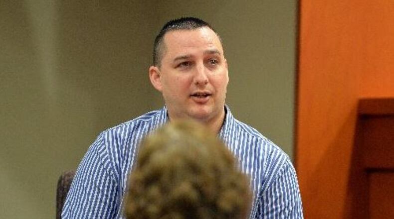 Brandon Cummings, owner of Power and Energy Services, testifies Monday morning. (KENT D. JOHNSON /KDJOHNSON@AJC.COM)