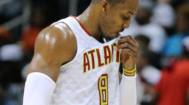 Former Hawks center Dwight Howard comes out of the game in the third quarter and did not return during a Game 6 playoff loss to the Washington Wizards. (Curtis Compton/ccompton@ajc.com)