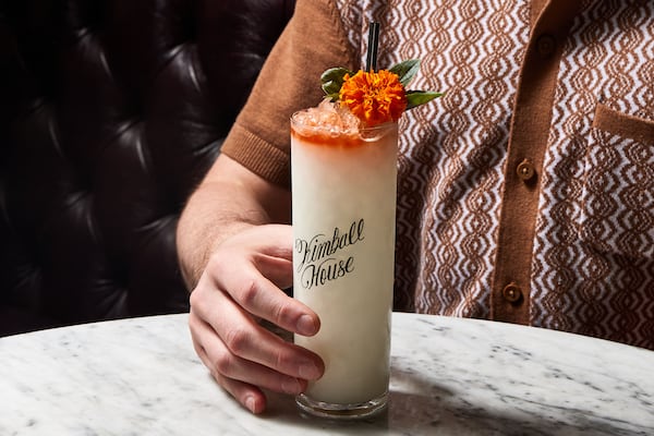 250820 Atlanta, Ga: Miles Macquarrie's Coconut & Basil Batida. Photo for Dining Guide 2025. Styling by Miles Macquarrie and Bailey Garrot. Photo taken Wednesday August 20, 2025 at Kimball House. AAJC 092825 DG Atlanta 50 (BAILEY GARROT FOR THE ATLANTA JOURNAL-CONSTITUTION)