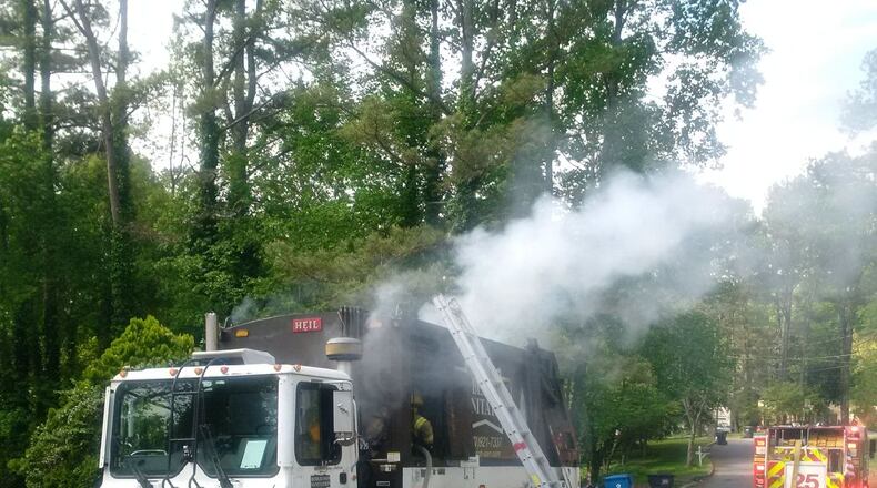A garbage truck caught fire in Gwinnett County on Monday morning.