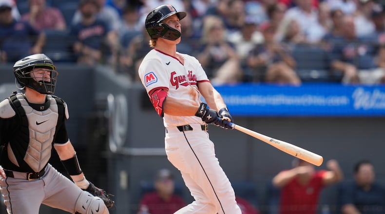 Cleveland Guardians' Petey Halpin, right, and catcher Kyle Teel, left, watch Halpin''s three-run home run in the sixth inning of a baseball game in Cleveland, Wednesday, Sept. 16, 2026. (AP Photo/Sue Ogrocki)