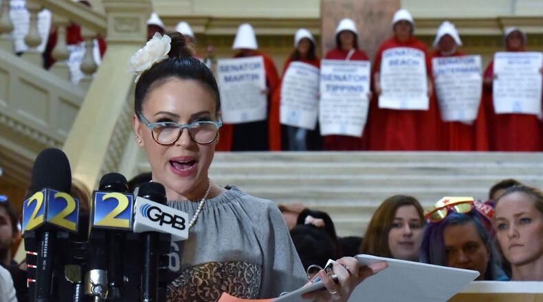 Actress Alyssa Milano speaks to members of the press after she delivered her boycott-threatening letter to Gov. Brian Kemp, urging him not to sign HB 481, the anti-abortion “heartbeat” bill. HYOSUB SHIN / HSHIN@AJC.COM