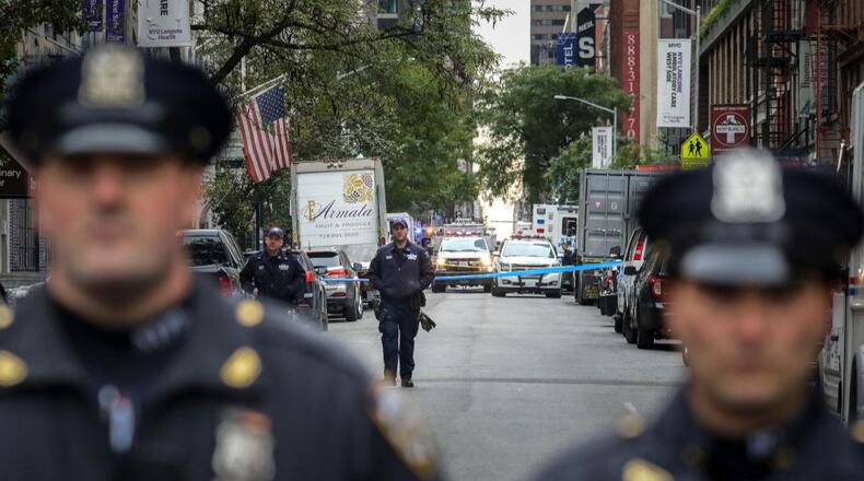 Police in New York City are searching for a suspect who jumped out a Brooklyn precinct window.