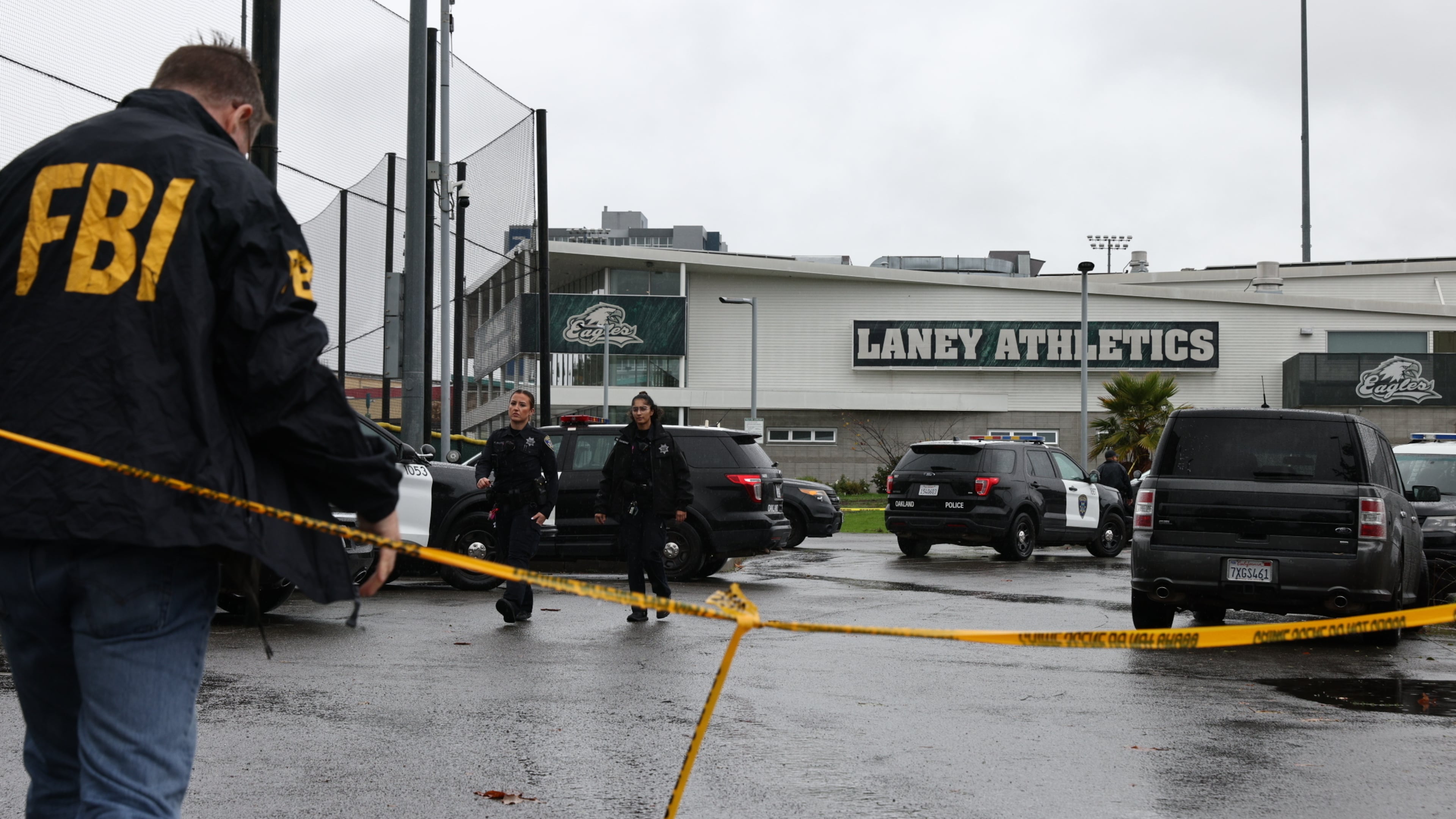 Law enforcement work the scene after a shooting at Laney College in Oakland, Calif., on Thursday, Nov. 13, 2025. (Santiago Mejia/San Francisco Chronicle via AP)