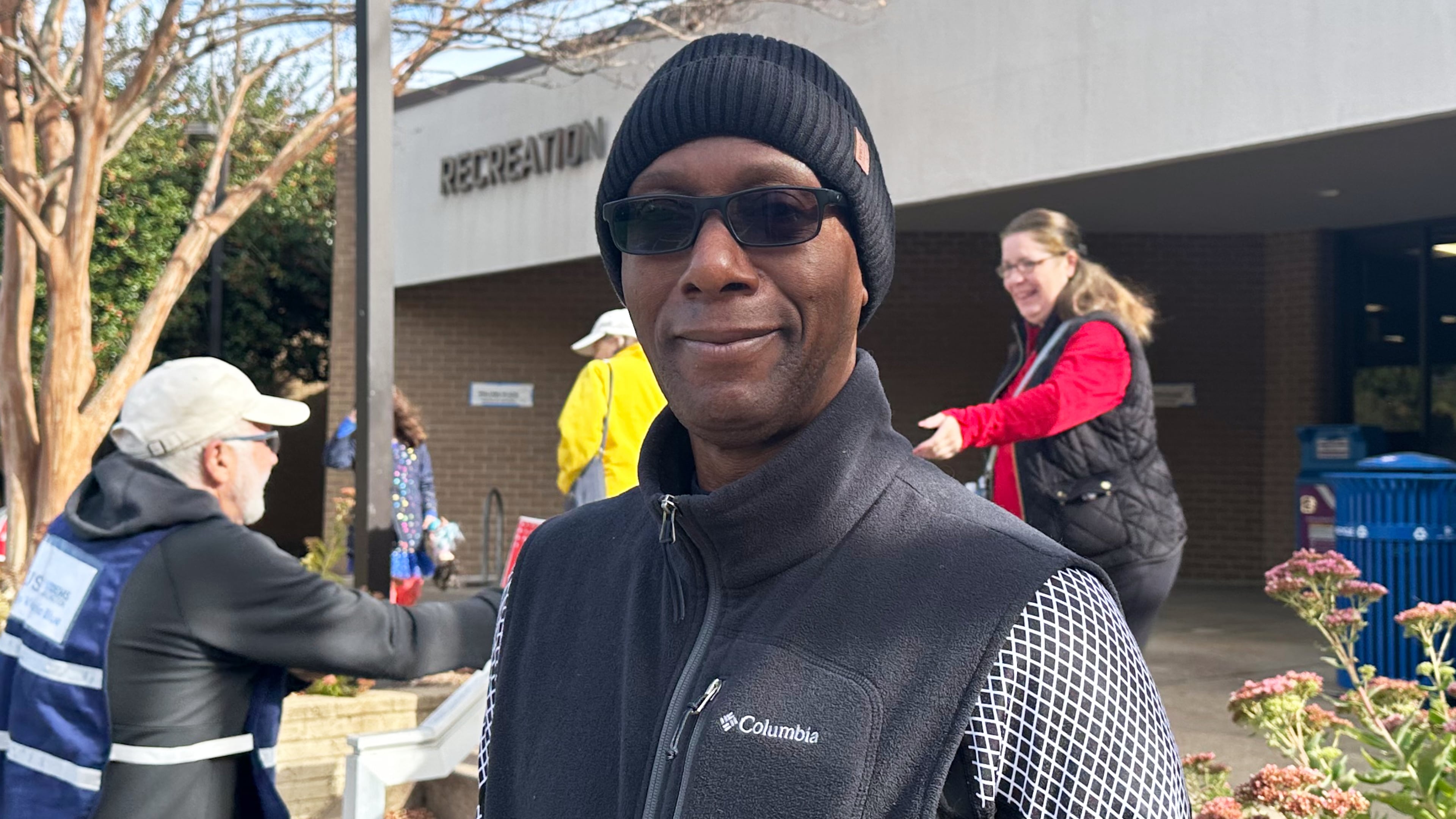 Alonzie Scott, a recently retired federal worker, is seen at an Arlington, Va., polling center on Tuesday, Nov. 4th, 2025. (AP Photo/Helen Wieffering)