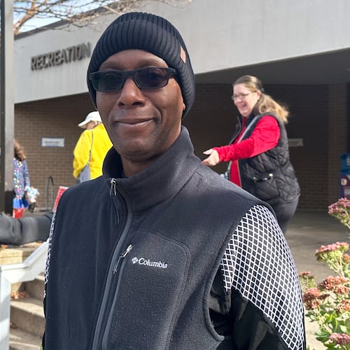 Alonzie Scott, a recently retired federal worker, is seen at an Arlington, Va., polling center on Tuesday, Nov. 4th, 2025. (AP Photo/Helen Wieffering)