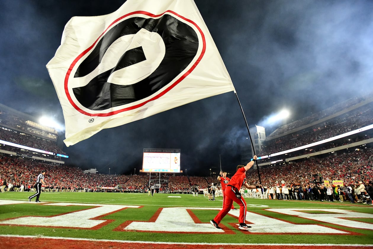 An Alpharetta man was sentenced in federal court to four years in prison in connection with a three-year scheme involving bogus investments and fake University of Georgia football tickets, officials said. (Hyosub Shin/AJC)