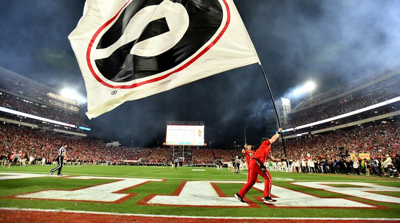 An Alpharetta man was sentenced in federal court to four years in prison in connection with a three-year scheme involving bogus investments and fake University of Georgia football tickets, officials said. (Hyosub Shin/AJC)