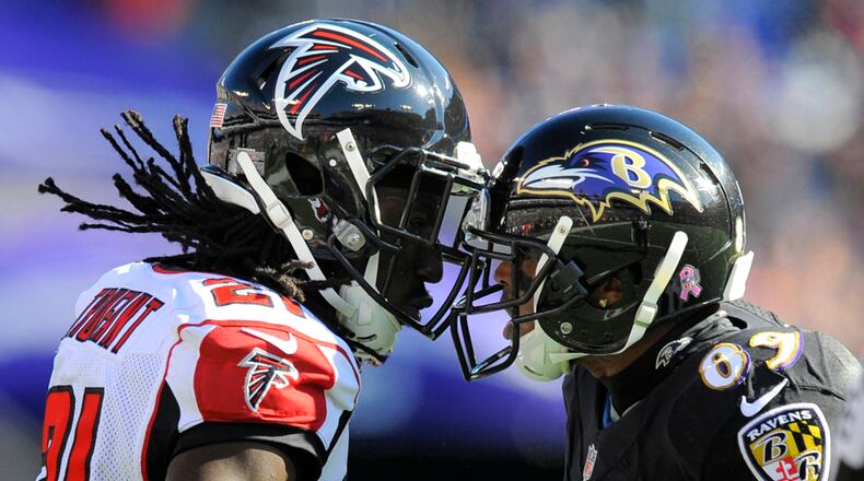 Falcons' Desmond Trufant and Baltimore Ravens' Steve Smith Sr. have a few words for one another after a third quarter play on Sunday, Oct. 19, 2014, at M&T Bank Stadium in Baltimore. (Lloyd Fox/Baltimore Sun/MCT)