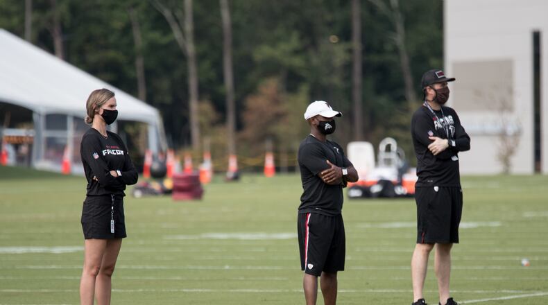 Kirsten Grohs (left), Anthony Robinson and David Bassity at Atlanta Falcons training camp Aug. 22, 2020 in Flowery Branch, Ga. Grohs is the Falcons' manager of football administration. (Photo by Atlanta Falcons/Kara Durrette)