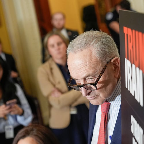 Senate Minority Leader Chuck Schumer, D-N.Y., listens during a news conference after a policy luncheon on Capitol Hill,Tuesday, April 14, 2026, in Washington. (AP Photo/Mariam Zuhaib)