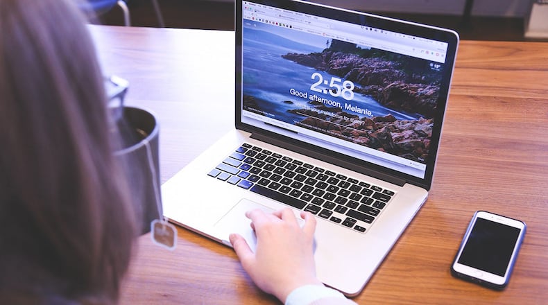 Stock photo of a woman using a computer.