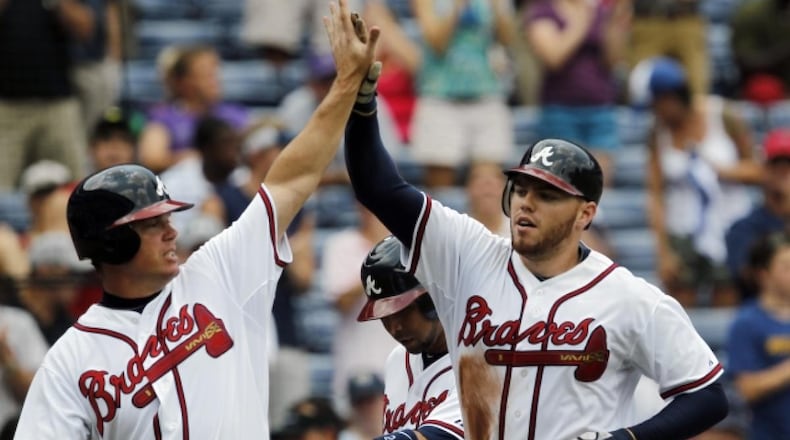 Retired Braves third baseman Chipper Jones (left) and Freddie Freeman were teammates early in Freeman’s career, and Jones has been proud watching Freeman develop into an MVP-candidate type of player. (AP file photo)