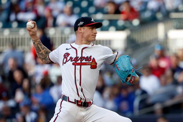 Atlanta Braves pitcher AJ Smith-Shawver throws during the first inning of a baseball game against the Cincinnati Reds, Monday, May 5, 2025, in Atlanta. (AP Photo/Butch Dill)