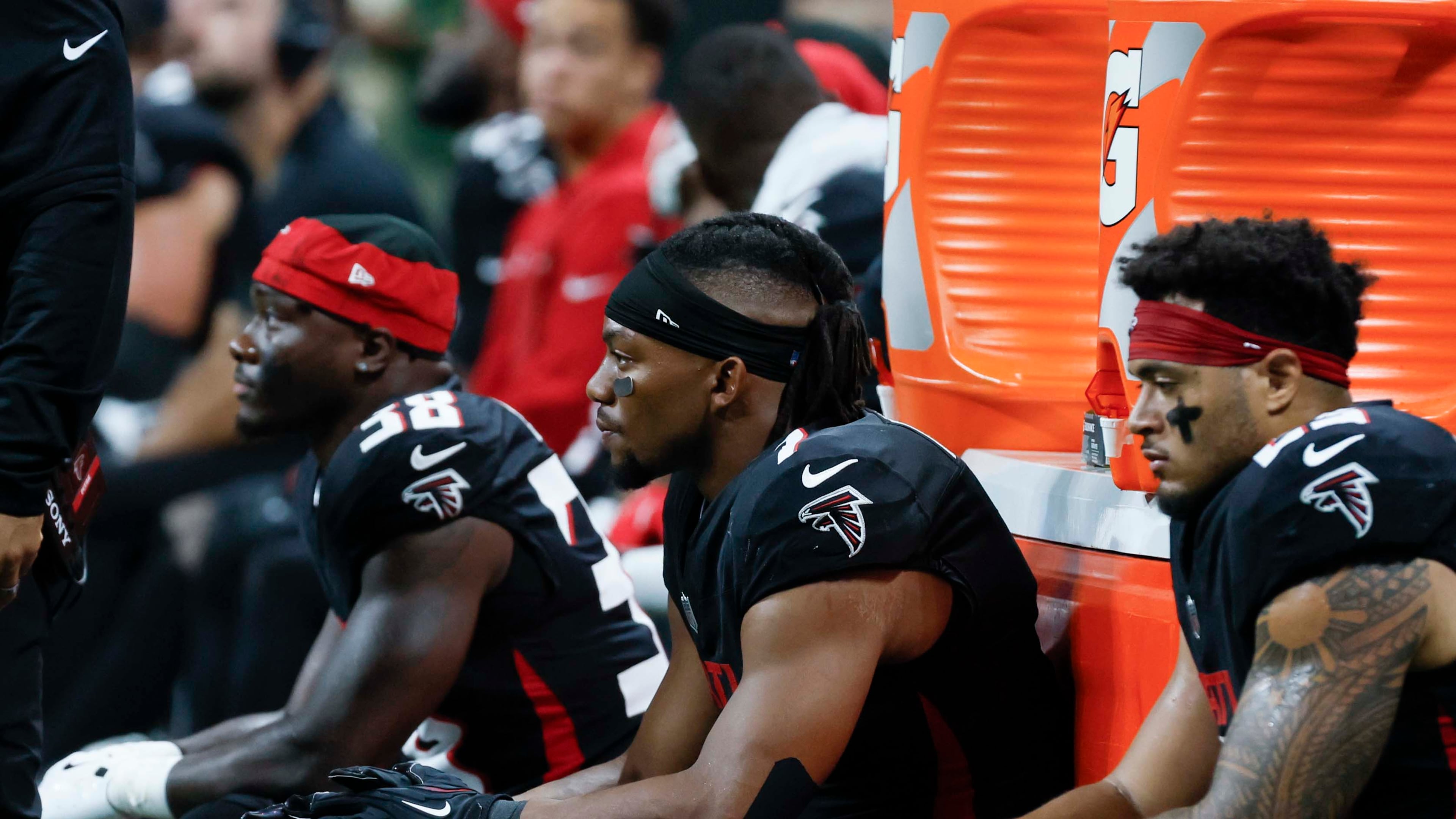 Atlanta Falcons running back Bijan Robinson (center) fumbled the ball in the third quarter Sunday. It was recovered by Miami. (Miguel Martinez/AJC)