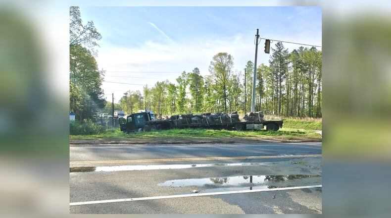 Ga. 108 in Cherokee County remains shut down Friday morning as deputies investigate a fatal wreck involving a tractor-trailer and an SUV.