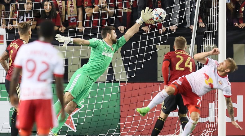 MARCH 5, 2017 Atlanta, Atlanta United goalkeeper Alec Kann tried to reach the ball on a play that the New York Red Bulls scored the first goal. (Miguel Martinez)