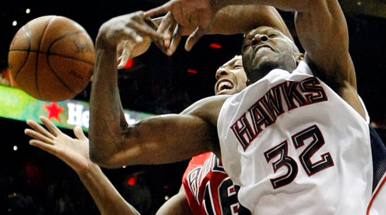 Hawks forward Joe Smith (32) has missed the past eight games with a dislocated left thumb.