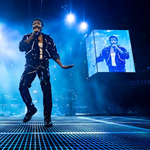 Childish Gambino dazzles a sold-out crowd at State Farm Arena in September 2024 in Atlanta. He was hoarse during the show and said he was recovering from the flu, but shortly thereafter he canceled the rest of the tour. (Ryan Fleisher for the AJC 2024)